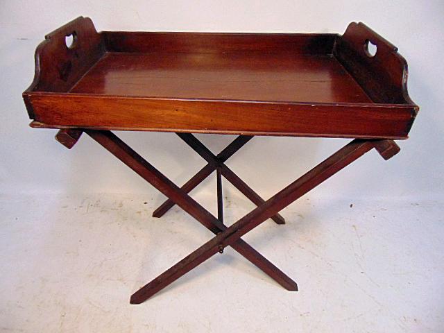 Butlers tray on folding base, tray is 28.25" by 19.25",: Butlers tray on folding base, tray is 28.25" by 19.25", height & as shown in photograph, on stand) is 30", needs a strap.