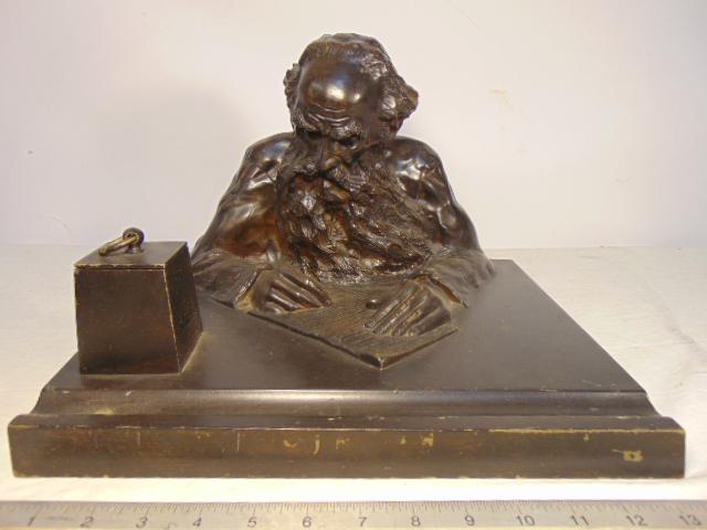 Tolstoy figural bronze desk tray, inkwell & pen tray,: Tolstoy figural bronze desk tray, inkwell & pen tray, dark patina, figural bronze showing Tolstoy writing at his desk, base is 12" by 14", height is 9.5", unsigned, no marks.