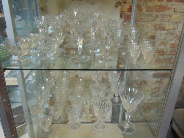 Large lot Baccarat crystal stemware, 54 assorted stems: Large lot Baccarat 54 pieces crystal stemware, 9 stems, 3 7/8" tall, 4 3 3/8"; one large Martini glass, 8 medium Martini glasses; 5 wine glasses; 11 small glasses, 7 shots; 5 cocktail glasses, 4 small
