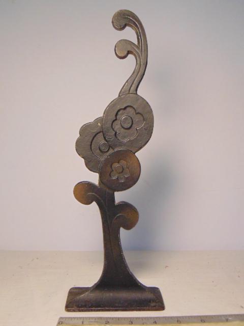 Cast iron art deco doorstop, floral design, height is (1 of 3)