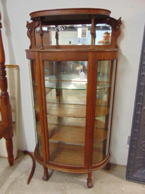Curved oak china cabinet with upper gallery, glass &: Curved oak china cabinet with upper gallery, glass & wood shelves, cabinet is 38" wide, 14" deep, height is 71.25"