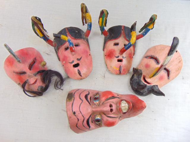 5 carved wood paint decorated masks, includes a (1 of 7)