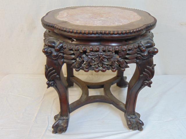 Chinese marble top plant stand, carved stretcher base, decorated with floral & dragon carvings,: Chinese marble top plant stand, carved stretcher base, decorated with floral & dragon carvings, stand is 16.5"" in diameter, height is 17.5"