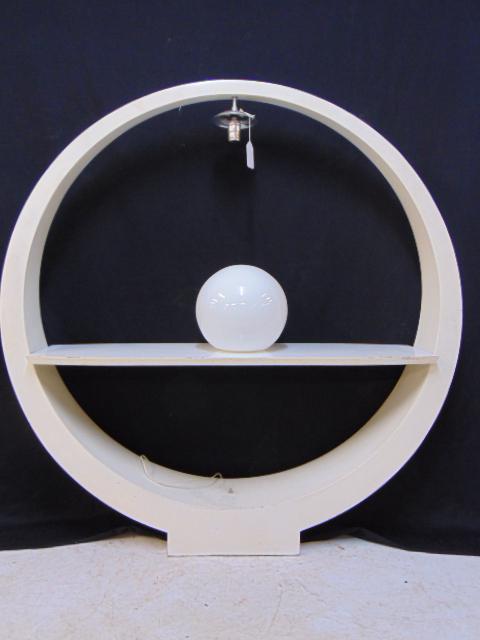 White lacquered shelf, round with white globe light, ex. Bob Lucioni Collection, shelf is 50" tall,: White lacquered shelf, round with white globe light, ex. Bob Lucioni Collection, shelf is 50" tall, 48" tall.
