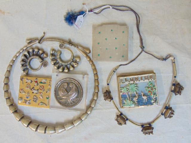 Lot compacts, jewelry, ethnic necklace, pair silver (?) earrings & heavy necklace & 4 compacts: Lot compacts, jewelry, ethnic necklace, pair silver (?) earrings & heavy necklace & 4 compacts including "Florida" souvenir compact