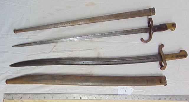 2 bayonets, French St Etienne bayonet with scabbard & vintage German Imperial 19th century PDL: 2 bayonets, French St Etienne bayonet with scabbard & vintage German Imperial 19th century PDL bayonet with metal scabbard with brass grip.