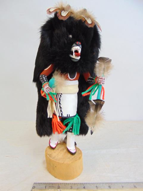 Kachina doll, "Wolf Kachina", by Raphael Sarracino, Hopi, paint, feather, fur, figure is 13.25": Kachina doll, "Wolf Kachina", by Raphael Sarracino, Hopi, paint, feather, fur, figure is 13.25" tall, signed.