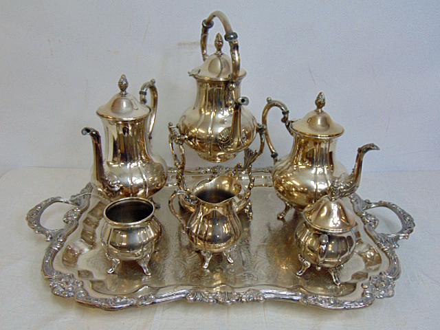 Large silver plate tea set, 7 pieces, tea pot on warmer base, 2 additional tea pots, creamer, open: Large silver plate tea set, 7 pieces, tea pot on warmer base, 2 additional tea pots, creamer, open bowl & lidded sugar bowl on large serving tray, tray is 29.75" by 18" (including handles)