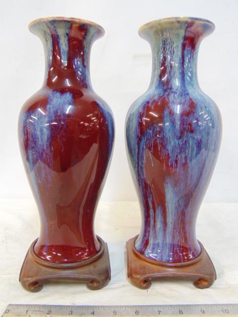 Pair Chinese vases, Oxblood with blue flares, signed, each vase is 12.25" tall, on wood bases, in (1 of 9)