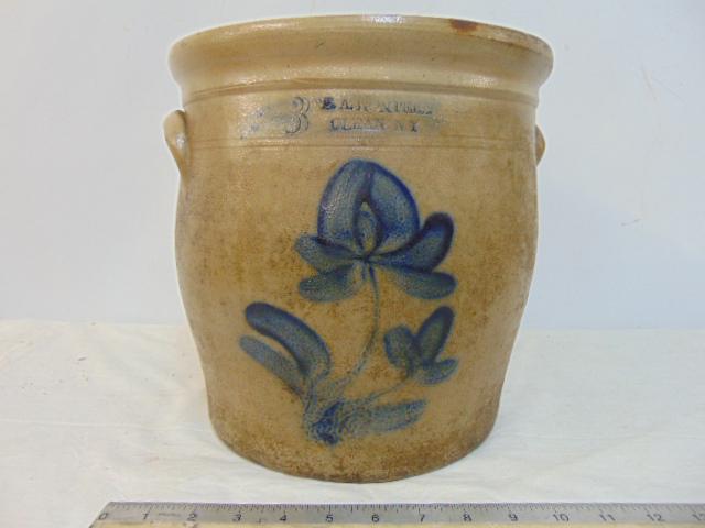Stoneware crock, E.A. Montell, Olean, NY, floral decorated, 11" tall, diameter is 11", has several: Stoneware crock, E.A. Montell, Olean, NY, floral decorated, 11" tall, diameter is 11", has several hairlines.