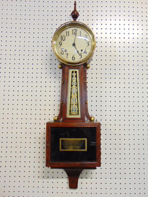 Ingraham banjo clock, spring driven, reverse painted decoration, top finial is loose, label inside, (1 of 5)