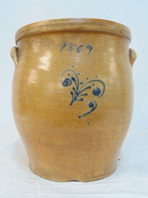 Stoneware crock, dated 1869, with simple curl decoration, no maker, several partial hairlines,: Stoneware crock, dated 1869, with simple curl decoration, no maker, several partial hairlines, chipped, height is 10.25", diameter is 8 7/8"