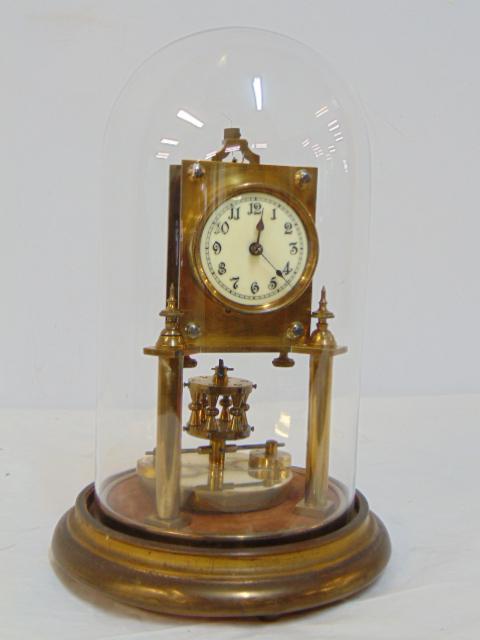 Domed anniversary clock, weighted pendulum has broken wire, Patent Angemeldet, 10.75" tall. (1 of 6)