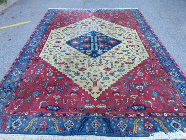 Room Size carpet, red, with light center medallion, rug is 9' by 12', has some stains, needs (1 of 4)