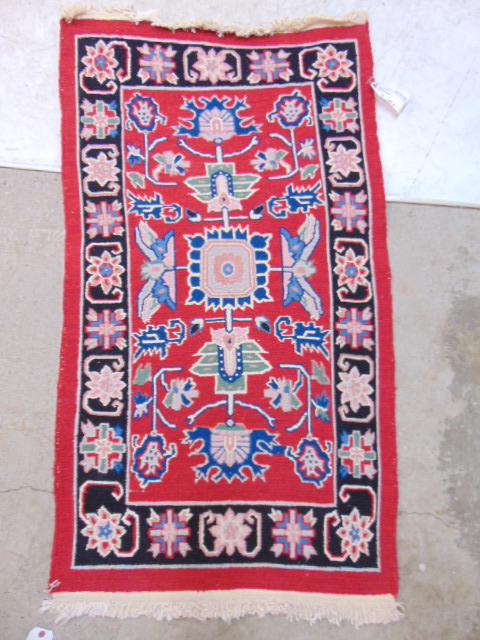 Scatter rug, in red, low pile, carpet is 33" by 58" (1 of 4)