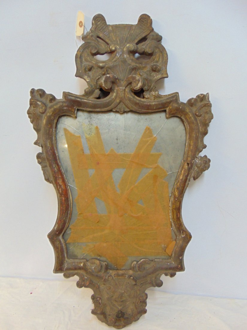 Early shield mirror, carved frame with head, crest, glass is broken, frame has loss to carvings, ap (1 of 8)