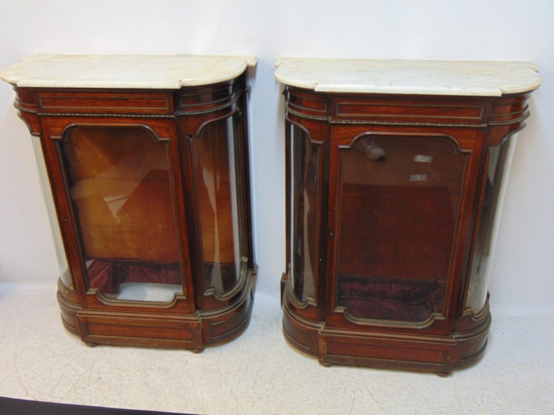 Pair Rosewood Victorian vitrines by George Walter Vincent Smith, bronze mounted: Pair Rosewood Victorian vitrines by George Walter Vincent Smith, bronze mounted curved front, marble tops, paper labels on back, one has loose leg, some molding is missing, 32.25" by 15.25", height is