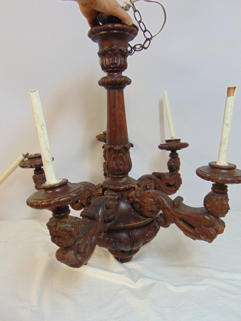 Carved oak chandelier with carved heads, 6 arms, arms loose, wiring as is, needs restoration (1 of 8)