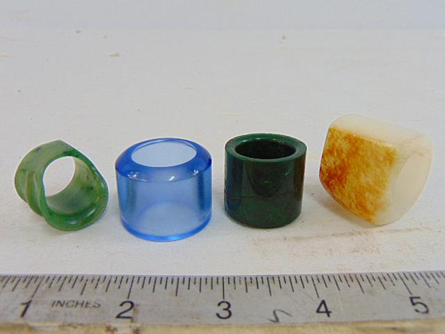 4 Chinese archer rings, Jade, stone, two in green, one in white, also includes ring in blue (stone, (1 of 11)