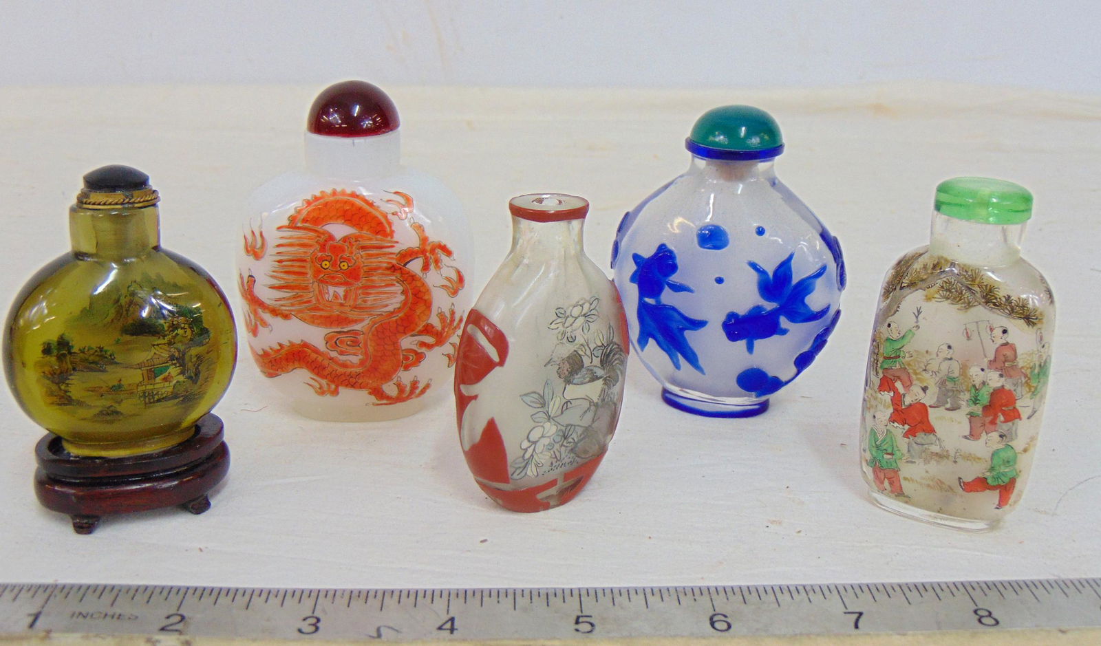 5 small snuff bottles, cameo glass, painted glass, one missing it's top, decorated with fish, (1 of 9)