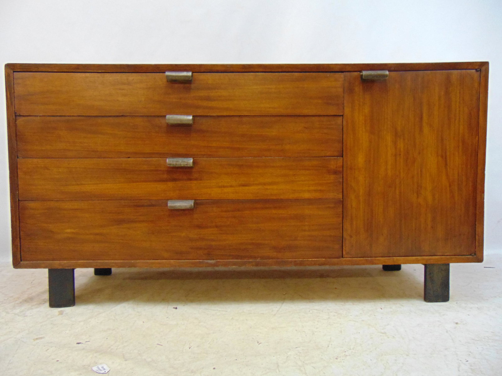 George Nelson for Herman Miller sideboard, cabinet flanked by 4 drawers, as found, scratches, veneer: George Nelson for Herman Miller sideboard, cabinet flanked by 4 drawers, as found, scratches, veneer damage, wear, chest is 56.25" by 18.5", height is 29.5"