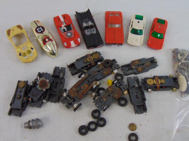 Lot slot cars, 7 upper bodies, including bat mobile & 6 works, with some parts, sold as is.: Lot slot cars, 7 upper bodies, including bat mobile & 6 works, with some parts, sold as is.