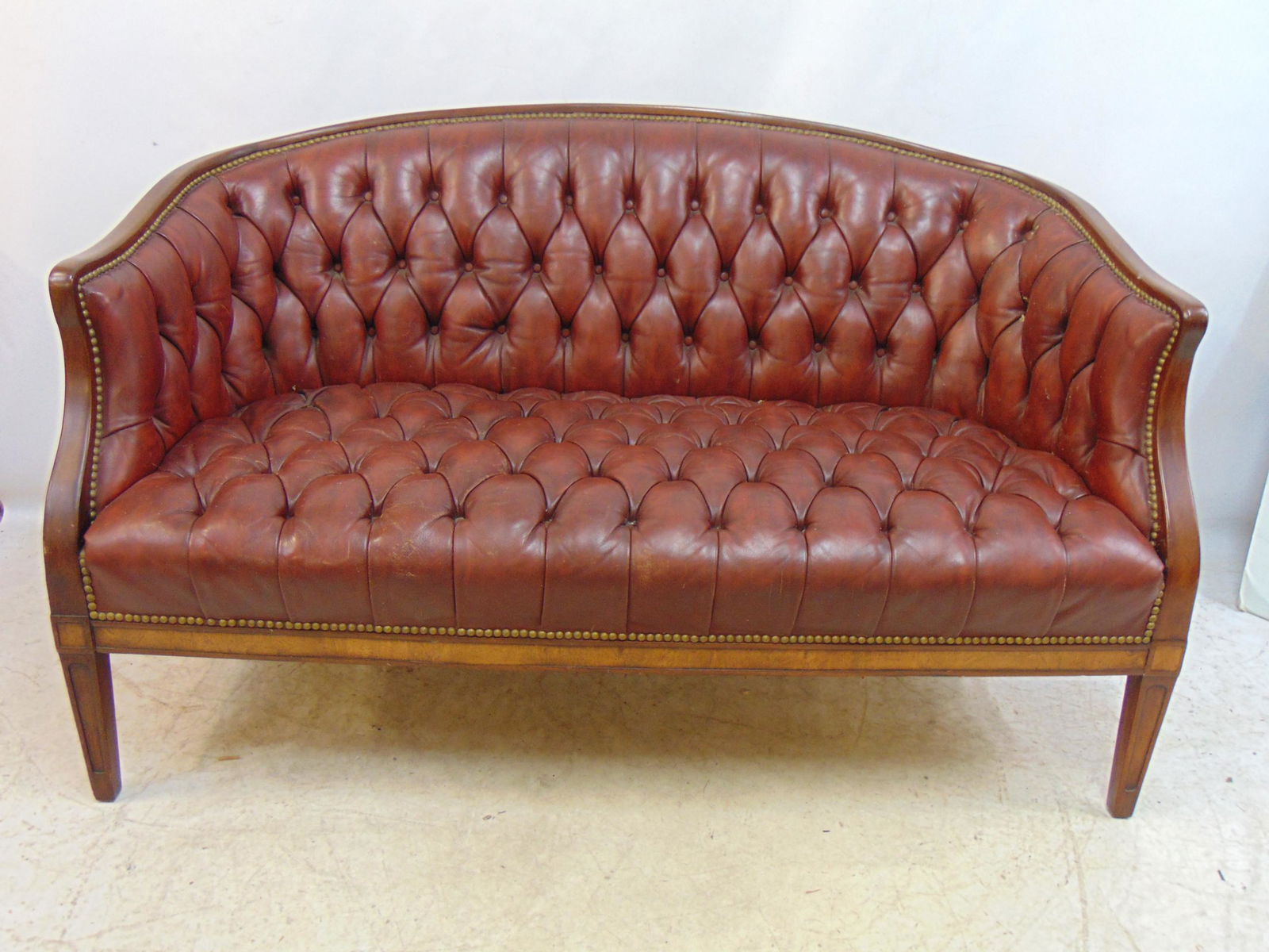 Leather tufted seat & back loveseat, in red burgundy, wood frame, bench is 52.5" by 27", height is (1 of 10)