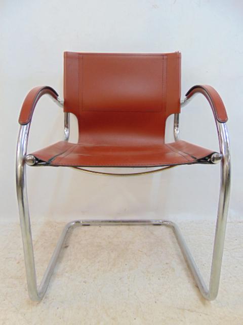 Mid Century chair, chrome tube frame & leather back & seat, leather stitching on seat is partially: Mid Century chair, chrome tube frame & leather back & seat, leather stitching on seat is partially ripped, chair is 21.75" wide, 21" deep, height is 32"