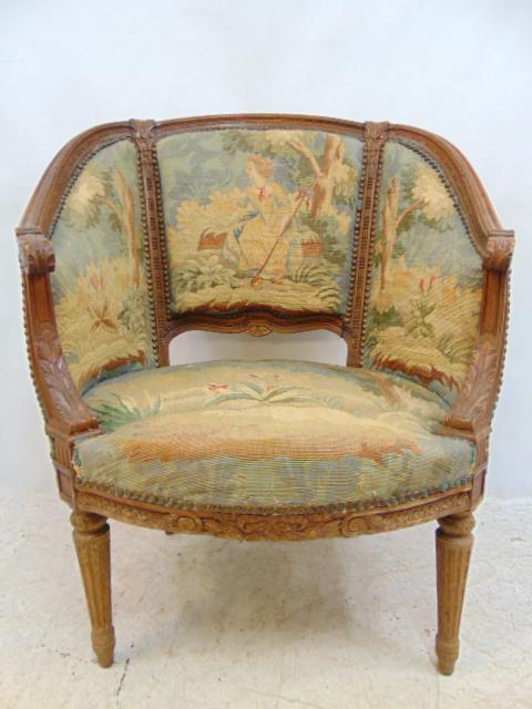 Aubusson upholstered arm chair with carved frame, chair is 29.5" wide, 20" deep, height is 34.75": Aubusson upholstered arm chair with carved frame, chair is 29.5" wide, 20" deep, height is 34.75" tall.