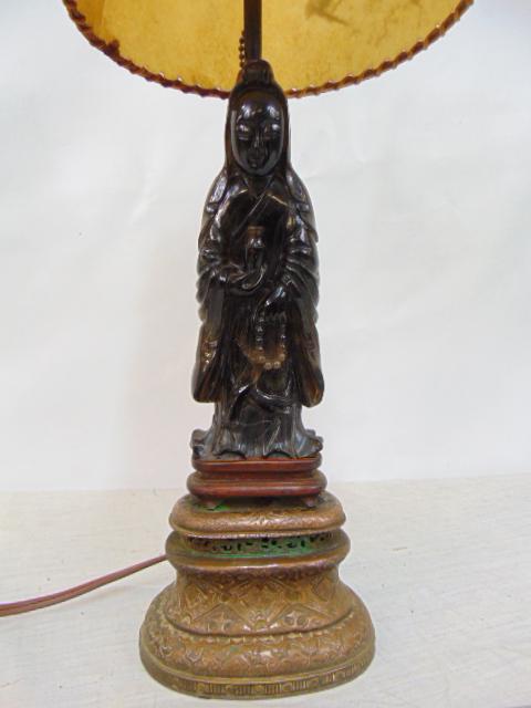 Carved Chinese figural lamp, figure holding urn, has various repairs, Jade ?, on metal base, height (1 of 5)