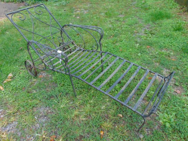 Iron chaise with adjustable back, in black, 69" long, 29.5" wide, decorated with leaves. (1 of 9)