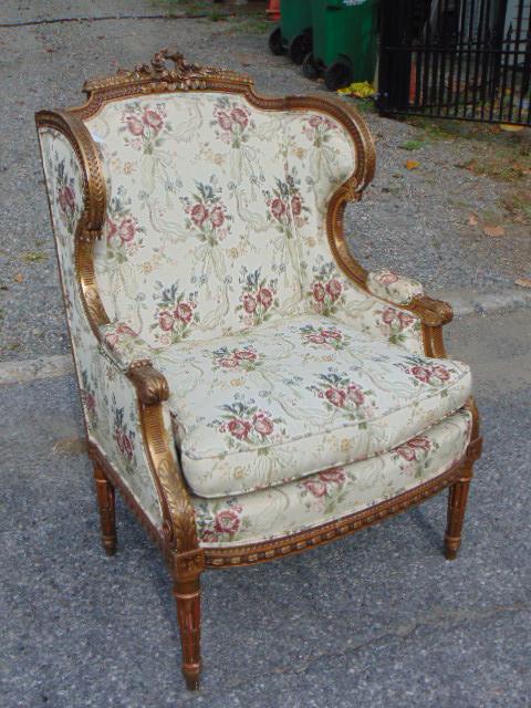 Ornate carved French arm chair with floral upholstery, chair is 28" wide, 20" deco, height is 43": Ornate carved French arm chair with floral upholstery, chair is 28" wide, 20" deco, height is 43"