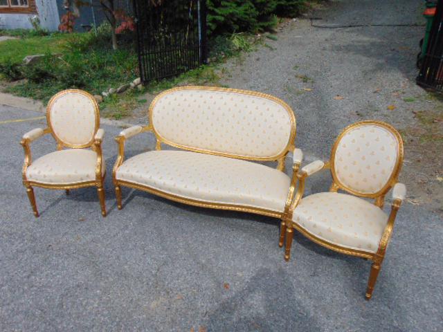 Gilt French style 3 piece salon set, settee, balloon back, carved detail, & 2 arm chairs. (1 of 5)