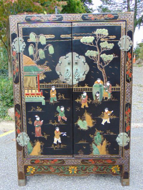 Chinois cabinet, lacquered, paint decorated and decorated with various stone inlaid figures, cabinet: Chinois cabinet, lacquered, paint decorated and decorated with various stone inlaid figures, cabinet is 32.25" by 16.25", height is 48", some damage to joints on corner.