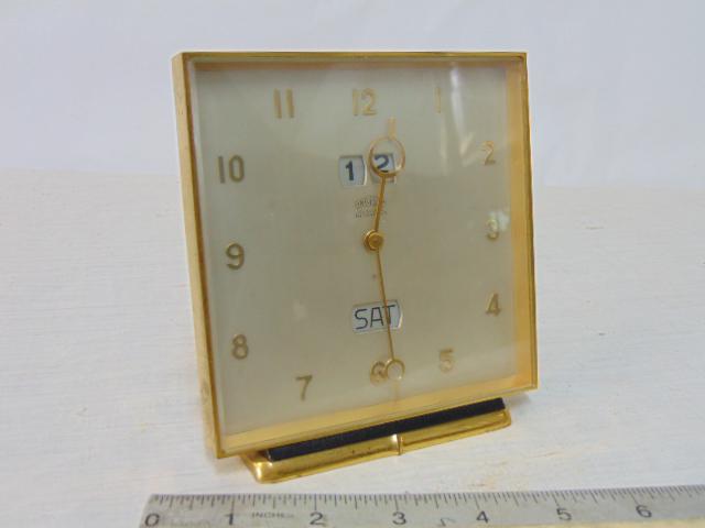 Tiffany Angelus travel clock, brass, with date, day, runs, but button that sets time is missing, (1 of 4)
