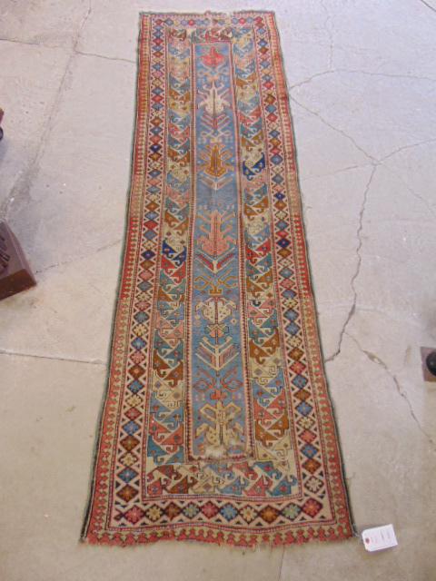 Caucasian runner, blue, red, has condition issues, hole, loss, carpet is 32" by 99": Caucasian runner, blue, red, has condition issues, hole, loss, carpet is 32" by 99"