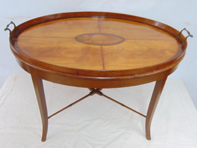 Satinwood inlaid oval coffee table, with brass butlers handles, has inlaid seashell in center, cross (1 of 4)
