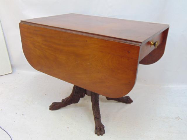 Empire mahogany drop leaf table with carved base, claw feet, top is 35" by 22.25" (open 35" by (1 of 6)