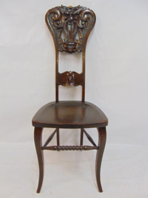Carved oak chair, tall back with carved demon head, chair is 15.5" by 15.25" (seat), height is 41.5": Carved oak chair, tall back with carved demon head, chair is 15.5" by 15.25" (seat), height is 41.5"