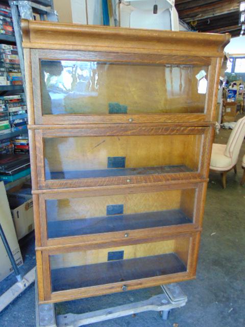 Oak barrister bookcase by Viking, stack bookcase has 4 sections plus top, base is missing. (1 of 4)