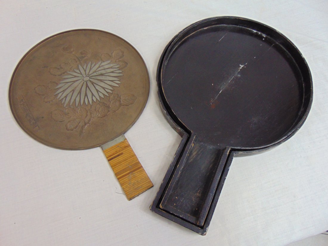 Japanese mirror, bronze with bamboo wrapped handle and floral decoration, signed, in wood case, mirr: Japanese mirror, bronze with bamboo wrapped handle and floral decoration, signed, in wood case, mirror is 13.25" long, width is 9.5"