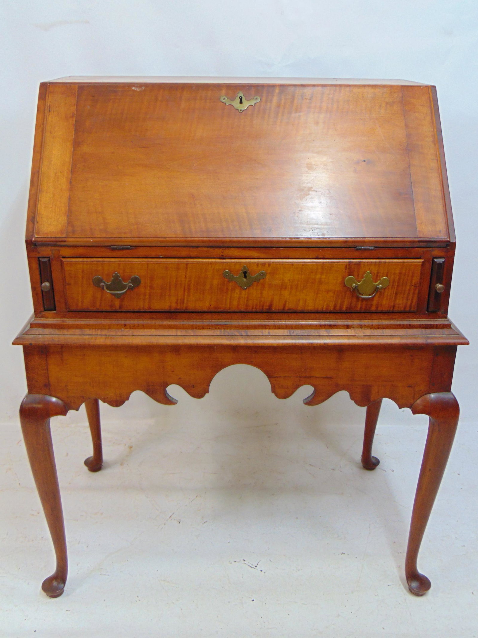 Antique tiger maple slant front ladies desk, queen Anne legs, pine secondary, two pieces, frame: Antique tiger maple slant front ladies desk, queen Anne legs, pine secondary, two pieces, frame base, desk is 33" by 20.5", height is 41.5".