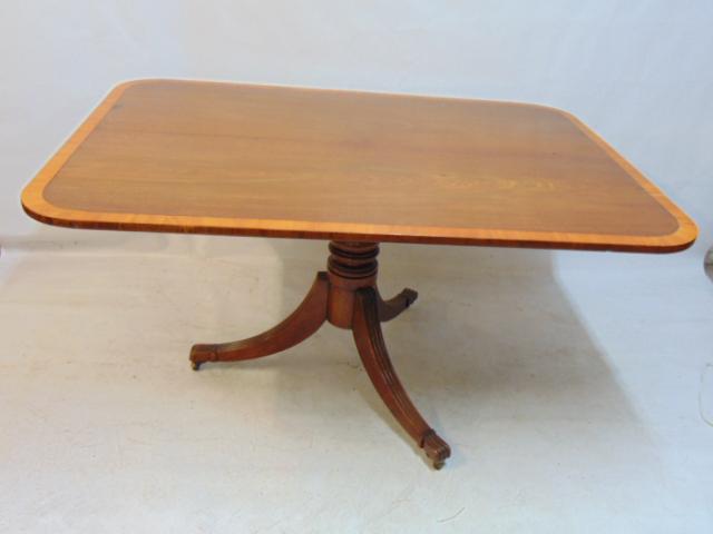 Inlaid mahogany breakfast table, Duncan Phyfe base, top is 38" by 54", height is 29": Inlaid mahogany breakfast table, Duncan Phyfe base, top is 38" by 54", height is 29"