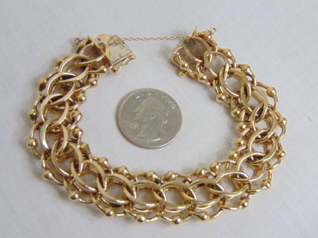 Jewelry. 14kt yellow gold Vintage Charm bracelet, 68.18 grams, 5/8" wide, 8" length, hallmark 14k,: Jewelry. 14kt yellow gold Vintage Charm bracelet, 68.18 grams, 5/8" wide, 8" length, hallmark 14k, safety chair, good condition