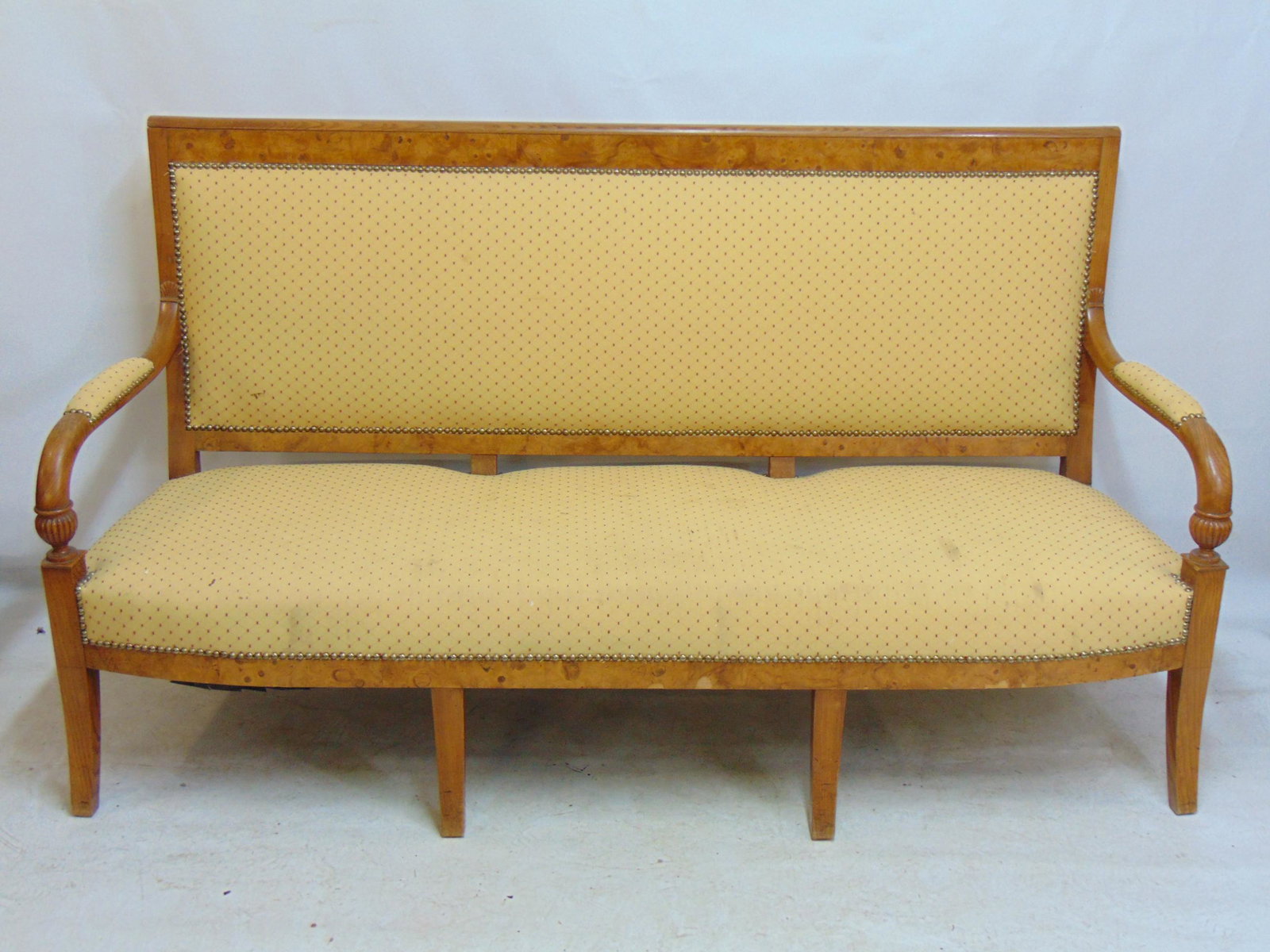 Biedermeier style bench or sofa, burl wood with armrests, yellow upholstery, some stains, 4 front: Biedermeier style bench or sofa, burl wood with armrests, yellow upholstery, some stains, 4 front legs, bench is 70" long, 25" deep, height is 39.5", seat height is 17"