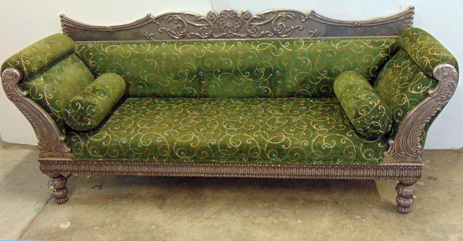 19th Spanish Colonial silver foil overlay sofa, green upholstered with designs, front & back carved: 19th Spanish Colonial silver foil overlay sofa, green upholstered with designs, front & back carved frame, entire frame covered in silver foil, some foil is a bit loose, sofa is 84" long, 25" deep, he