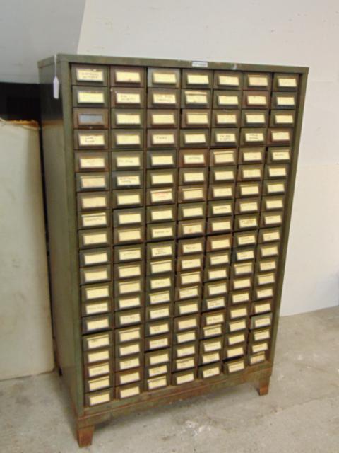 Addressograph multi drawer industrial file or parts cabinet, cabinet has 19 rows with 7 drawers,: Addressograph multi drawer industrial file or parts cabinet, cabinet has 19 rows with 7 drawers, cabinet is 38.75" wide, 23" deep, height is 62", note, heavy item. purported Sing Sing prison provenanc