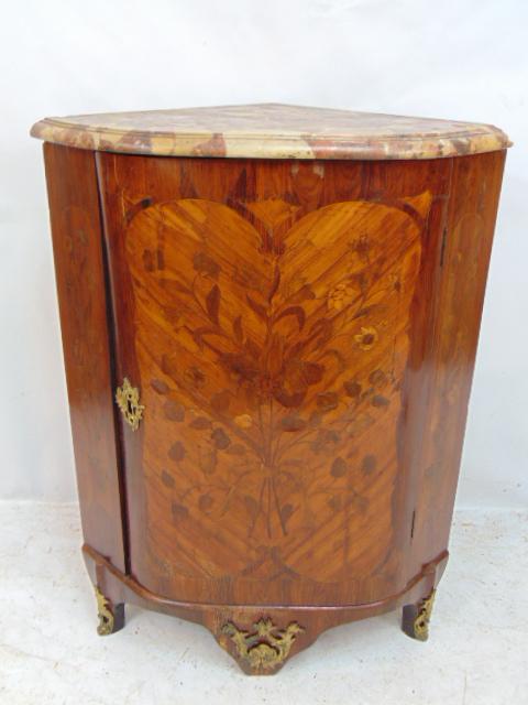 Inlaid marble top corner cabinet with bronze decoration, large single door with extensive floral: Inlaid marble top corner cabinet with bronze decoration, large single door with extensive floral inlay, marble is chipped, cabinet is 19.75" deep (measured straight from front to back), height is 36.2