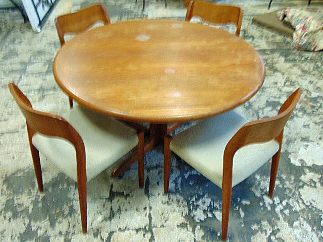 Danish Mid Century table & 4 chairs, by E. Valentinsen (table) & J.L. Moller Models (chairs), table: Danish Mid Century table & 4 chairs, by E. Valentinsen (table) & J.L. Moller Models (chairs), table has no leaves, round, 49.25" in diameter, height is 27.75", top has stains.