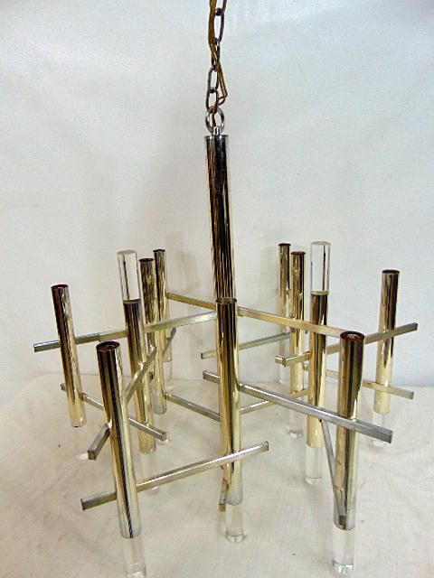 Gaetano Sciolari chrome & Lucite chandelier, with 9 sockets, fixture is 22" tall, 25" across.: Gaetano Sciolari chrome & Lucite chandelier, with 9 sockets, fixture is 22" tall, 25" across.